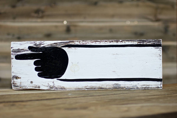 Hand Pointing Left (black hand, white sleeve) — Hand Painted Sign